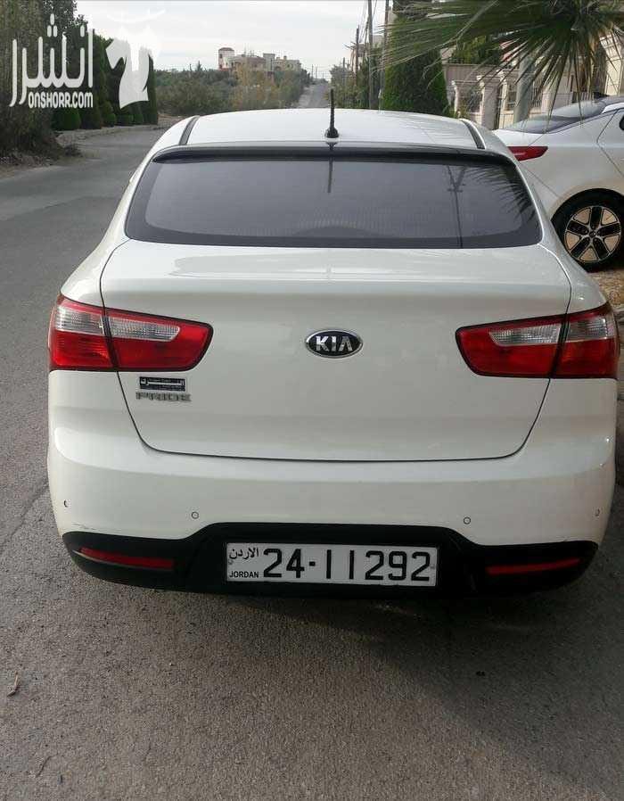 كيا برايد موديل 2014 فحص كامل / حره جديد من شهر 7 جير اتوماتيك توبترونك اربعه غيار ماتور 1400cc قوي واقتصادي جلد اسود مدفا الكراسي الاماميه مكيف بارد جدا تحكم ستيرنج مري ضب (سنتر) وغمازات عالمري حساس...