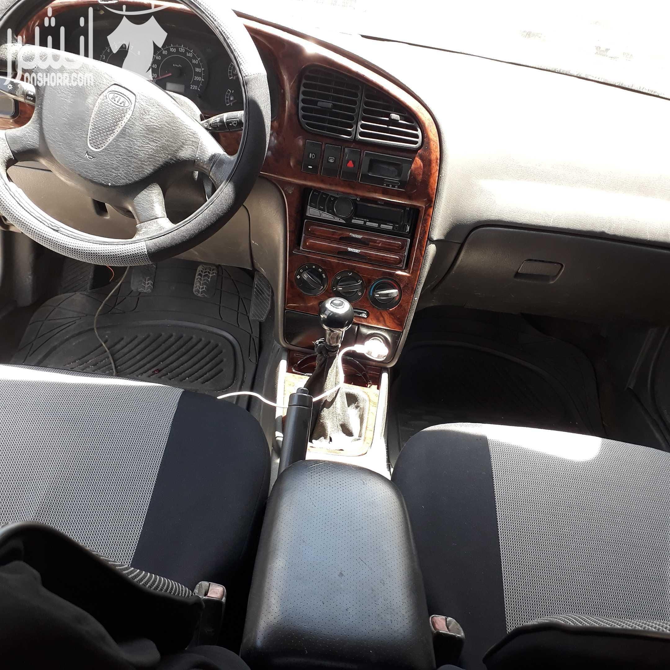 كيا سبكترا اربعه جيد بحالة الوكالة ماتور فحص جديد بيان جمركي مرخصه لشهر ١٨/٧/٢٠١٨ فرمايكا مركه وبيت نضاره كشافات داخليه حلوه كتير السياره بصلاه على النبي مش ناقصه حاجه