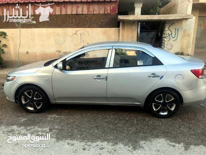 سياره فورتي ٢٠١٠للبيع بسعر رمزي لون سلفر فحص فل فل من عيدا فتحه كمره اماميه وخلفيه قير اتوماتيك وتب ترنك سياره شغل وامشي فحص قير وماتور السعر ٩٣٠٠ سعر قابل للتفاوض بشي بسيط