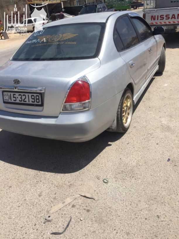 هونداي افانتي xd 2001 لون سلفر دهان ممتاز ترخيص طويل غرفه وتابلو فرمايكه وكاله فحصها موجود بالصور فحصها كويس وماتور بعطي 55٪ وقير اوتوماتيك ممتاز السياره فل ما عدا الفتحه ترخيص طويل طقم نقل خارجي ك...