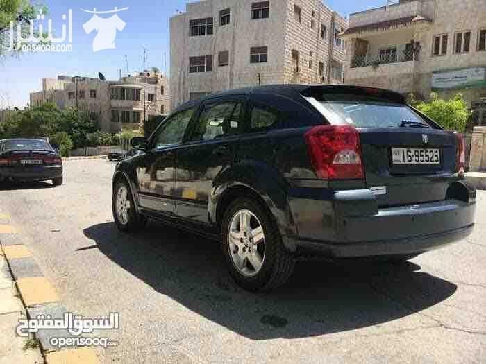 دودج كالبر الفحص 4 جيد ماتور 2000 سي سي جير اوتوماتيك لون فيراني مميز وضع السيارة توب نظافة صيانة كاملة من زيوت فلاتر بركات بواجي هيئة امامية خلفيو من صنوبرصات و كفات و عمدان توازن و جلود (لا...