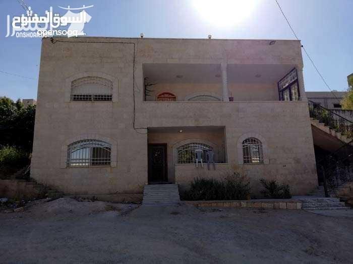 منزل مستقل للبيع على قطعة أرض مساحتها ٩٦٥ متر في اربد-إيدون-الحيّ الغربي بالقرب من مسجد خلف التل مكوّن من طابقين الأرضي مساحته ١٢٠ متر مربع والطابق التاني ٢٤٠ متر مربع والمطبخ راكب في الطابقين مع و...