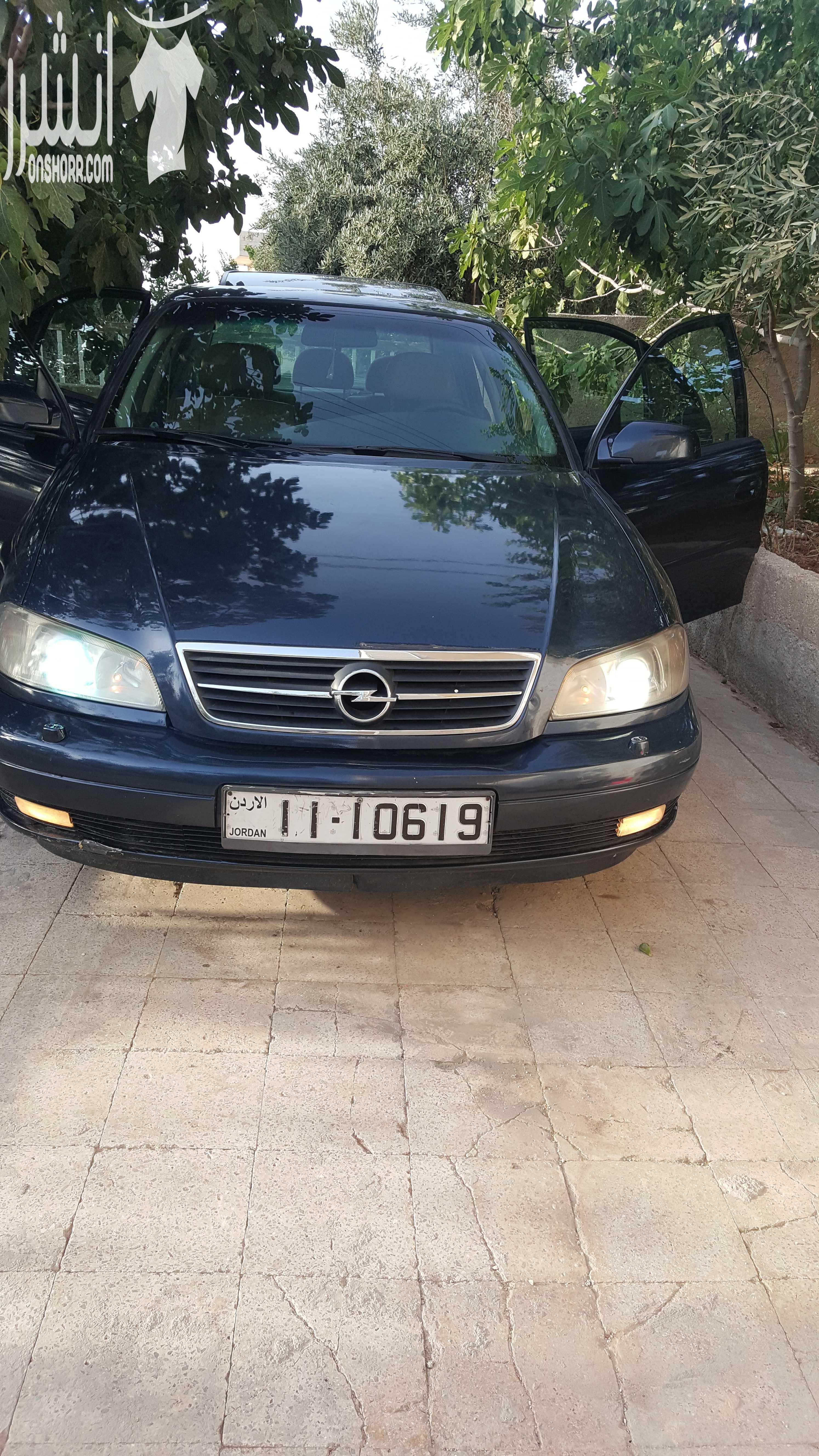 اوبل اوميغا موديل 2003 لون كحلي 2200سي سي ،جنط 17 اصلي، فتحة، حساسات خلفية اصلية، مثبت سرعة، مسجل philips مع سي دي تشينحر اصلي، تحكم طارة، اضوية زنون، نظام امان للاطفال و السرقة، فرش جلد، كراسي كهرب...