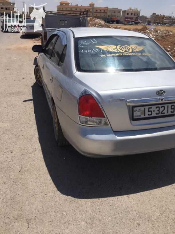 هونداي افانتي xd 2001 لون سلفر دهان ممتاز ترخيص طويل غرفه وتابلو فرمايكه وكاله فحصها موجود بالصور فحصها كويس وماتور بعطي 55٪ وقير اوتوماتيك ممتاز السياره فل ما عدا الفتحه ترخيص طويل طقم نقل خارجي ك...