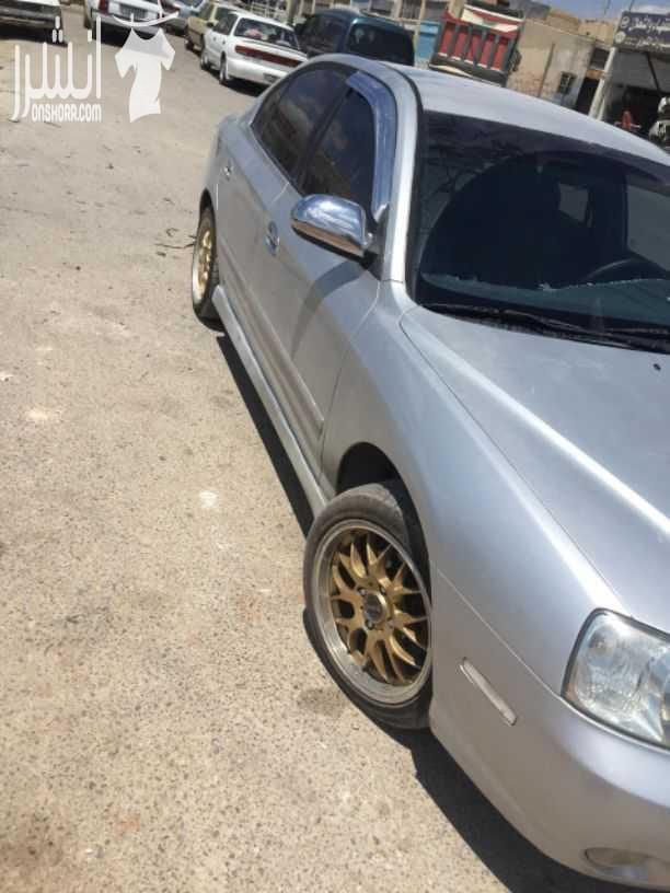هونداي افانتي xd 2001 لون سلفر دهان ممتاز ترخيص طويل غرفه وتابلو فرمايكه وكاله فحصها موجود بالصور فحصها كويس وماتور بعطي 55٪ وقير اوتوماتيك ممتاز السياره فل ما عدا الفتحه ترخيص طويل طقم نقل خارجي ك...