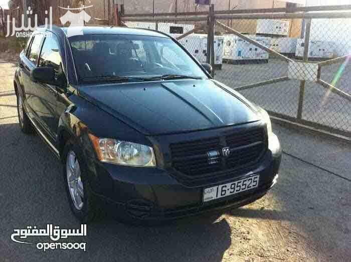 دودج كالبر الفحص 4 جيد ماتور 2000 سي سي جير اوتوماتيك لون فيراني مميز وضع السيارة توب نظافة صيانة كاملة من زيوت فلاتر بركات بواجي هيئة امامية خلفيو من صنوبرصات و كفات و عمدان توازن و جلود (لا...