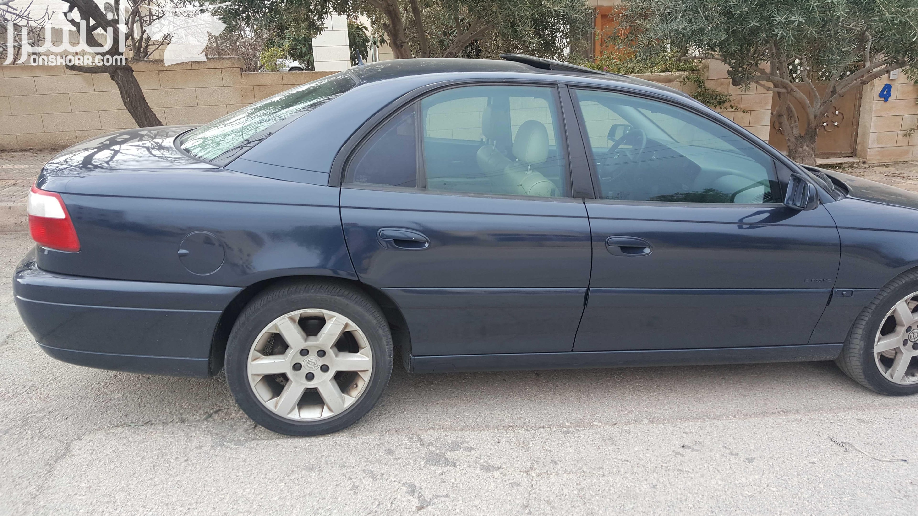 اوبل اوميغا موديل 2003 لون كحلي 2200سي سي ،جنط 17 اصلي، فتحة، حساسات خلفية اصلية، مثبت سرعة، مسجل philips مع سي دي تشينحر اصلي، تحكم طارة، اضوية زنون، نظام امان للاطفال و السرقة، فرش جلد، كراسي كهرب...