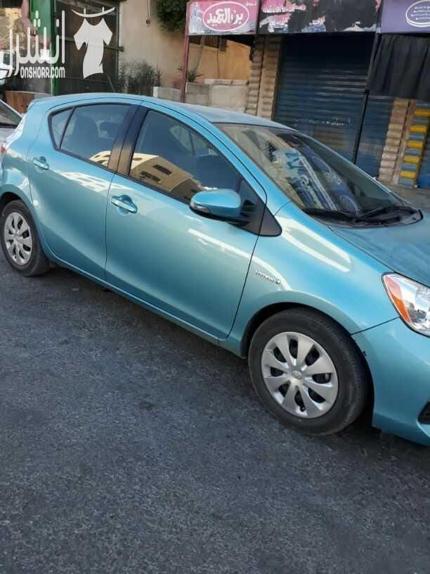بريوس سي ٢٠١٤ بحالة جيدة اضافات كاميرا خلفيه شاشة بصمة عداد ٢٤٠٠٠ غمازات عالمري مثبت سرعة مانع انزلاق استخدام شخصي مالك واحد الفحص مرفق مع الصور