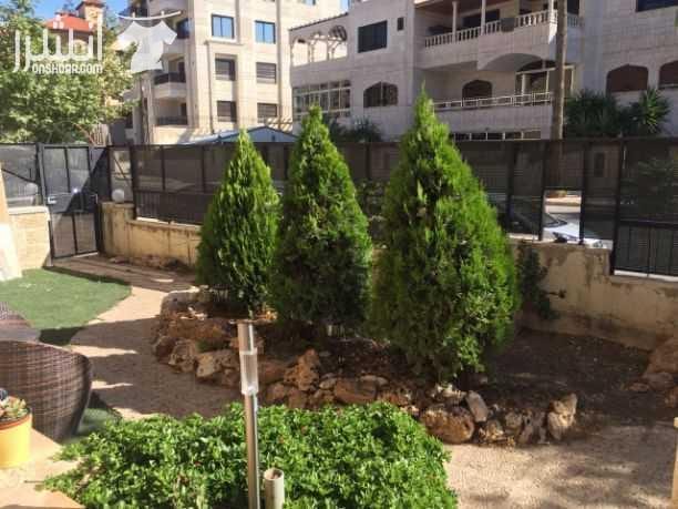 شقة أرضية فاخرة للبيع ضاحية الرشيد شارع أم عمارة منطقة هادئة ومحاطة بفلل المساحة الإجمالية 170متر مربع مع حديقة 75 متر مربع،مدخل انتركم مستقل كاميرات أرضيات رخام وباركيه، كراج تدفئة، خزائن بالحائط ،م...