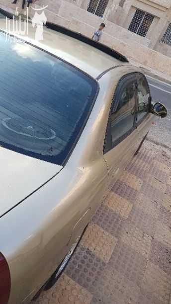 دايو نوبيرا موديل ١٩٩٩ اضفات فل عدا القير ماتور ١٥٠٠ انجكشن اربع فردات كوشوك جداد جنط المنيوم ١٤ فتحه كرستال كهربا ٣ حركات مرخصه لأخر شهر ١١ فحص السياره ٢ جيد ٢ مضروب