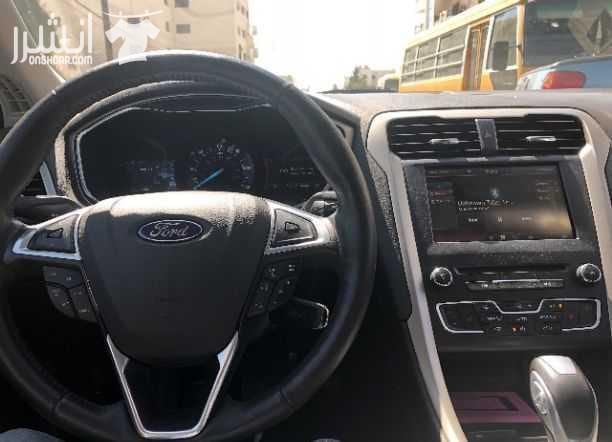 سياره للبيع فورد فيوجن موديل ٢٠١٦ انيرجي هايبرد بحاله الوكاله المسافه المقطوعه ٢٠ الف ميل الاضافات فل ناقص فتحه السقف فحص ٤ جيد لون السياره فيراني داخل جلد اسود المراجعه الاتصال على الرقم 0785014455