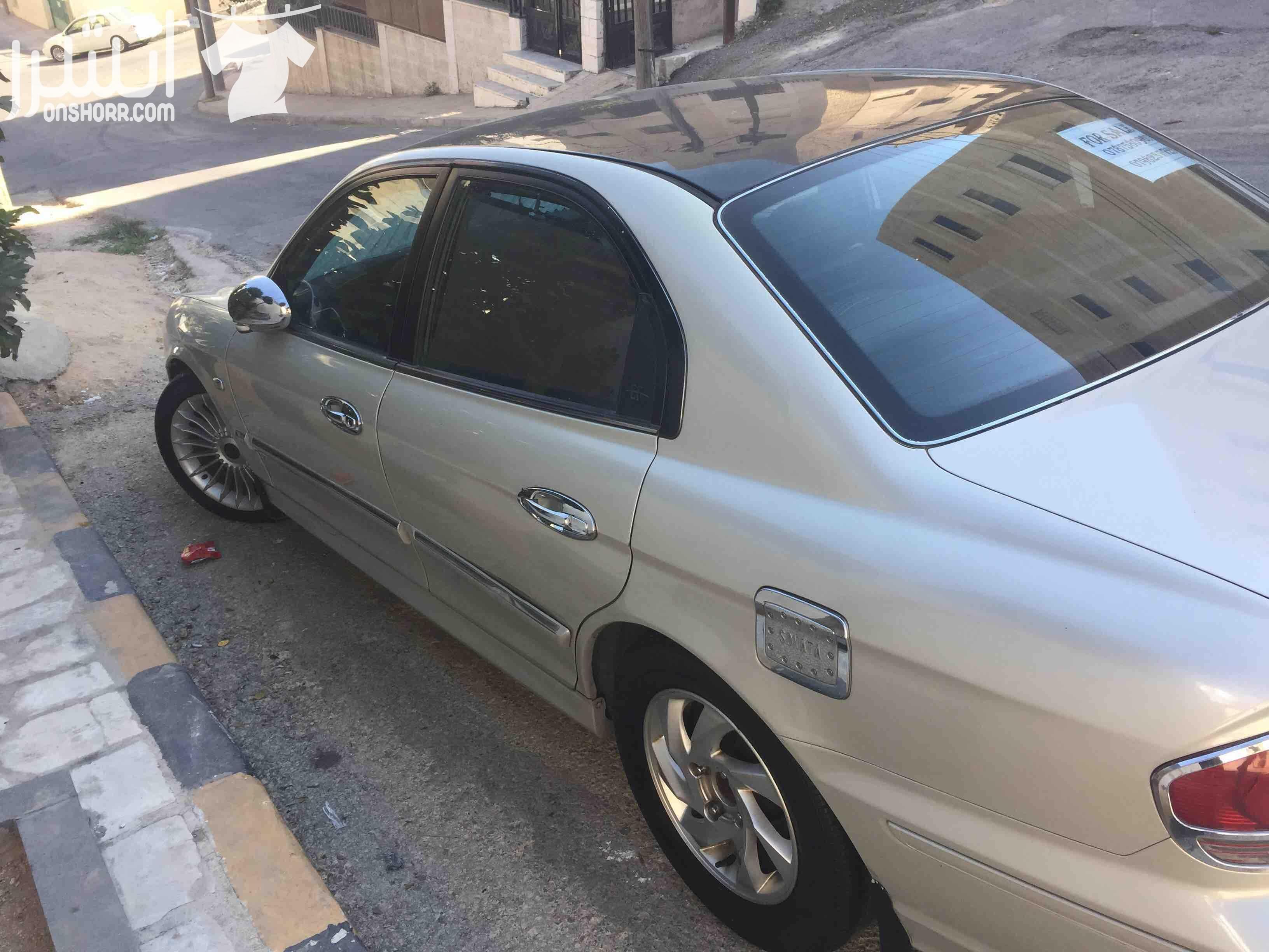 هونداي سوناتا 2002 محرك 2000 cc سلفر مميز تنده سوداء نازله على الرخصه جير تب ترونك جلد بالكامل مكيف حامي بارد شغال 100% مسجل كينود شاشه تتش الأصلي سماعات بيونير الأصلي جنط 17 البينا الله يبارك لصاحب ا...