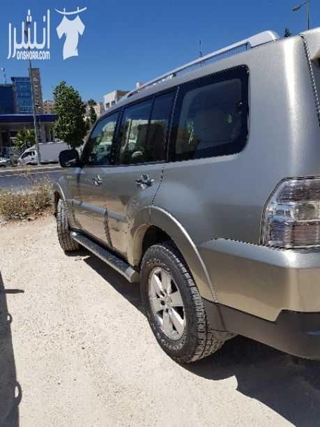 ميتسوبيشي باجيرو موديل ٢٠٠٧ الشكل الجديد. كاملة الاضافات. ماتور ٣٠٠٠ سي سي. فحص جديد لدى مركز الشريف ٧ جيد. للبيع المستعجل بداعي السفر