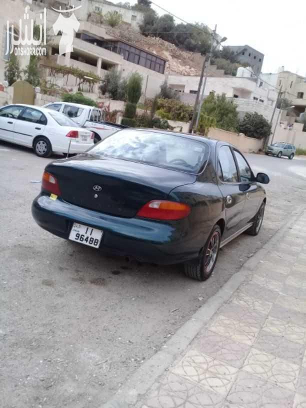 هيونداي افانتي موديل 1997 اللون أخضر زيتي جير اتومتك ماتور 1500 انجكشن قوي واقتصادي الفحص :. امامي : جيد ، مضروب أمام العجل خلفي : جيد ، جيد بور كندشن شغال ميه بالميه سنتر لوك مع ريموت فورمايك...