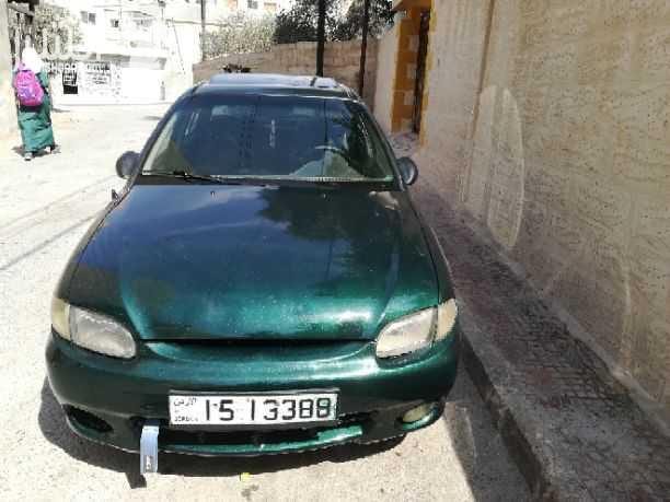 هونداي اكسنت موديل 1997 السياره منفوضه بالكامل ويوجد فيها فتحه بالسقف 3 حركات كرستال فحصها خالي قص قلبان خالي غيار السياره مدهونه من يومين ومرخصه لغايه 31_5_2019 للبيع بسعر 3000 كااش عارف عكوبه 078668...