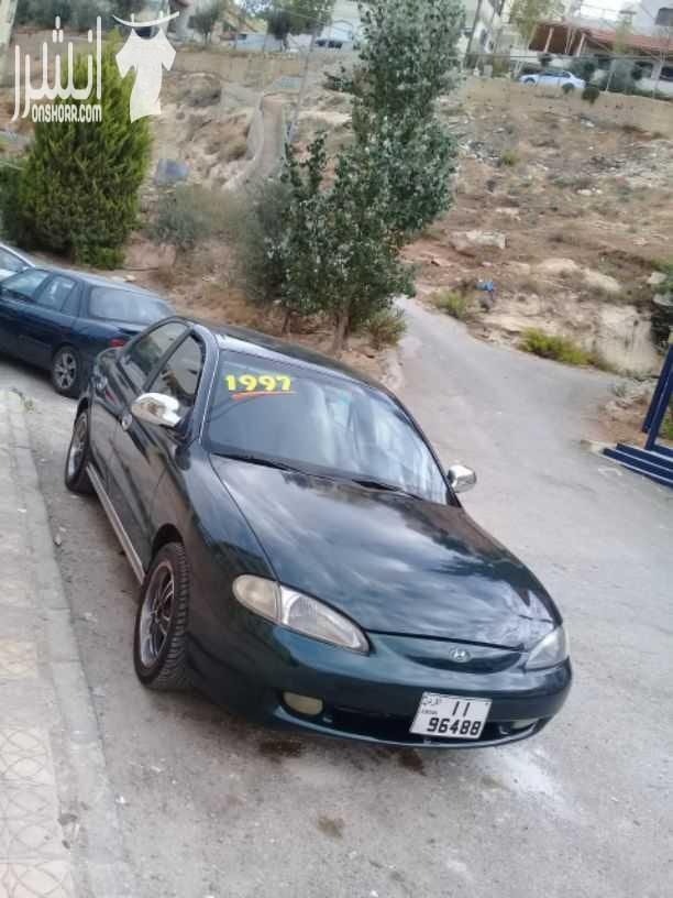 هيونداي افانتي موديل 1997 اللون أخضر زيتي جير اتومتك ماتور 1500 انجكشن قوي واقتصادي الفحص :. امامي : جيد ، مضروب أمام العجل خلفي : جيد ، جيد بور كندشن شغال ميه بالميه سنتر لوك مع ريموت فورمايك...