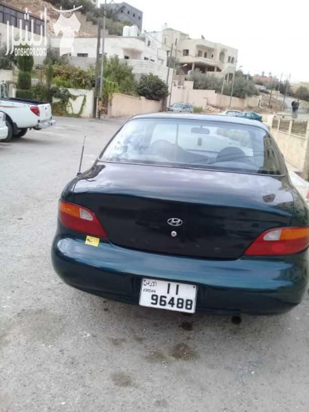 هيونداي افانتي موديل 1997 اللون أخضر زيتي جير اتومتك ماتور 1500 انجكشن قوي واقتصادي الفحص :. امامي : جيد ، مضروب أمام العجل خلفي : جيد ، جيد بور كندشن شغال ميه بالميه سنتر لوك مع ريموت فورمايك...
