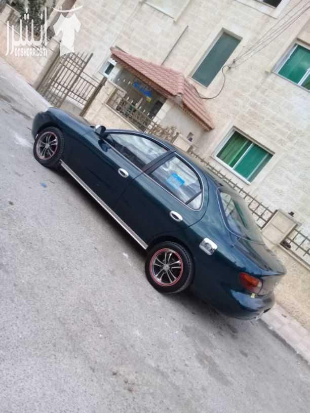 هيونداي افانتي موديل 1997 اللون أخضر زيتي جير اتومتك ماتور 1500 انجكشن قوي واقتصادي الفحص :. امامي : جيد ، مضروب أمام العجل خلفي : جيد ، جيد بور كندشن شغال ميه بالميه سنتر لوك مع ريموت فورمايك...