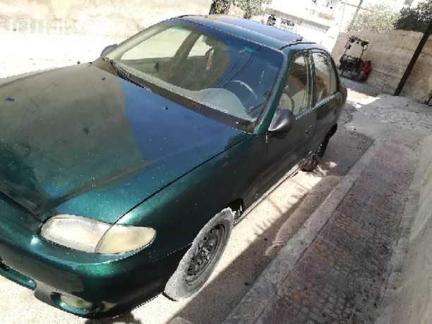 هونداي اكسنت موديل 1997 السياره منفوضه بالكامل ويوجد فيها فتحه بالسقف 3 حركات كرستال فحصها خالي قص قلبان خالي غيار السياره مدهونه من يومين ومرخصه لغايه 31_5_2019 للبيع بسعر 3000 كااش عارف عكوبه 078668...
