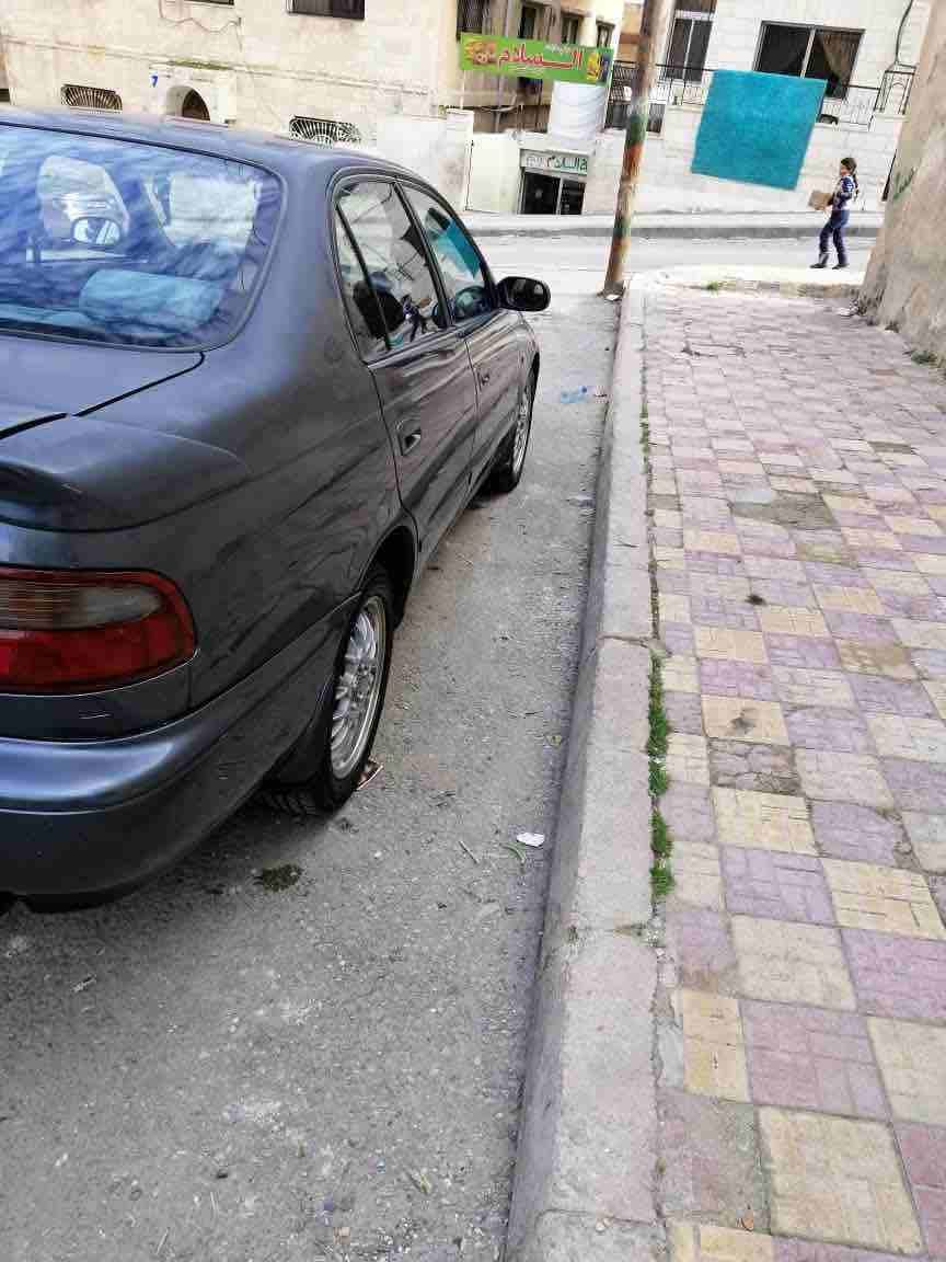 تويوتا كرونا 1992 متور 2000 وارد الشركة المالك الثاني للسياره زجاج ومراية كهرباء مسجل سي دي جنط وكوشوك جديد صيانه ومتابعه دائمة بالشركة واستعمل خفيف للسيارة